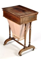 Lot 1041 - A 19th Century rosewood games/work table, the...