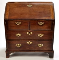 Lot 1043 - A George III mahogany bureau, the rectangular...