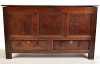 Lot 1054 - An 18th Century oak mule chest, the hinged...