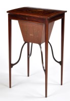 Lot 1062 - An Edwardian mahogany work table, the top...