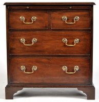 Lot 1067 - A 19th Century mahogany chest of two short and...