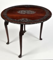 Lot 1076 - A George III mahogany drop leaf dining table,...