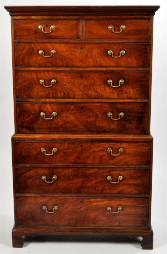 Lot 1079 - A George III mahogany chest on chest, the...