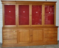 Lot 1084 - An early 20th Century oak bookcase, the...