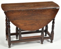 Lot 1106 - An 18th Century oak gateleg table, the pair of...