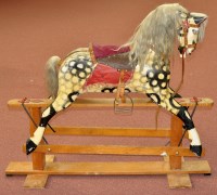 Lot 1112 - An early 20th Century rocking horse, painted...