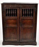 Lot 1116 - A late 17th Century oak livery cupboard, the...