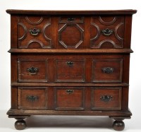 Lot 1117 - A Jacobean oak chest of three long drawers,...