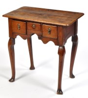 Lot 1118 - An early 18th Century Provincial oak lowboy,...