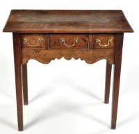 Lot 1128 - An 18th Century oak lowboy, the rectangular...