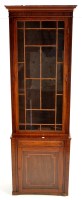 Lot 1143 - A late Georgian mahogany narrow bookcase, with...