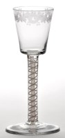 Lot 31 - Engraved opaque twist wine glass, the bucket...