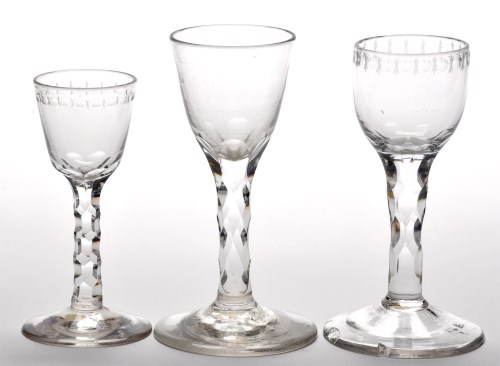 Lot 38 - Three faceted stem wine and cordial glasses,...