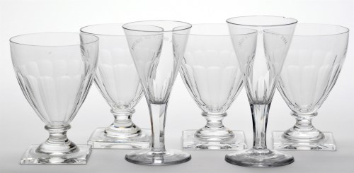 Lot 39 - Set of four glass rummers, with faceted sides...