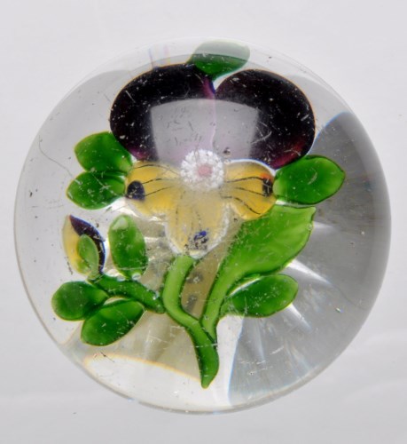 Lot 64 - Baccarat purple pansy paperweight, star cut...