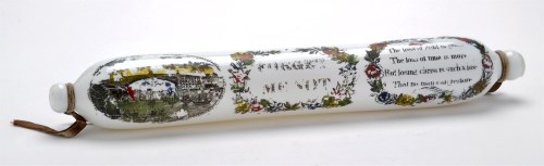 Lot 68 - Printed opaque glass rolling pin of North East...