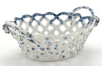 Lot 94 - Worcester blue and white basket, printed with '...