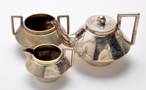 Lot 605 - A three-piece bachelors tea service, in the...