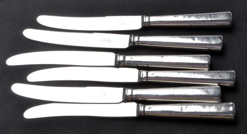 Lot 674 - Six 19th Century silver handled table knives,...