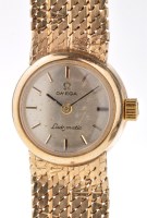 Lot 745 - Omega Ladymatic: a lady's 9ct. gold watch,...