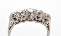 Lot 767 - A five stone diamond ring, the old cut...