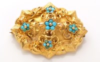 Lot 773 - A yellow metal and turquoise brooch, the...