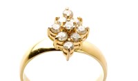 Lot 788 - A diamond ring, the nine brilliant cut...