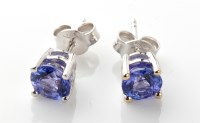 Lot 792 - A pair of tanzanite stud earrings, each...