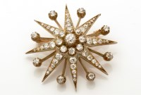 Lot 803 - A Victorian diamond star pattern brooch, the...