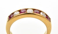 Lot 816 - A ruby and diamond ring, the four circular...