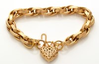 Lot 826 - A Victorian style 9ct. yellow gold bracelet,...