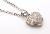 Lot 834 - A diamond heart-shaped pattern pendant, with...