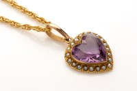 Lot 835 - An amethyst and seed pearl heart-shaped...