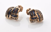 Lot 838 - A pair of sapphire and diamond ear clips, set...