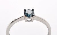 Lot 859 - A blue diamond ring, the brilliant cut blue...