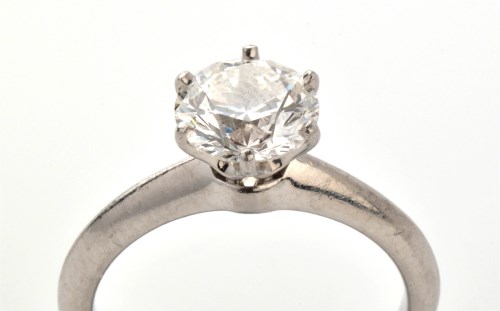 Lot 868 - Tiffany & Co: a single stone diamond ring, the...