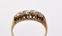 Lot 877 - A five stone diamond ring, the graduated old...