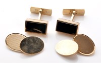 Lot 878 - A pair of 9ct. yellow gold cufflinks, each...