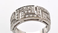 Lot 903 - A diamond dress ring, the Greek key design set...