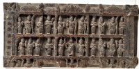 Lot 409 - A carved Indian hardwood panel, depicting...