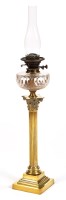 Lot 454 - A 19th Century brass oil lamp, the cut glass...