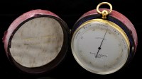 Lot 468 - A compensated travelling barometer by Negretti...