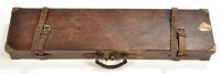 Lot 518 - A leather on wood shotgun case, fitted for a...