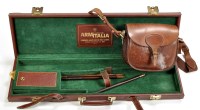 Lot 523 - An imitation leather on wood shotgun case, for...