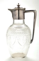 Lot 539 - A cut glass claret jug with plated mounts,...