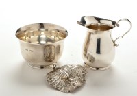 Lot 552 - A George VI cream jug and matching sugar bowl,...