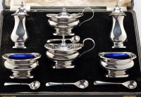 Lot 565 - An Elizabeth II six-piece condiment set, by...