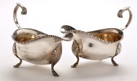 Lot 571 - A pair of George V gravy boats, by Reid & Sons,...