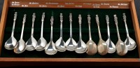 Lot 573 - A set of thirteen Elizabeth II apostle spoons,...