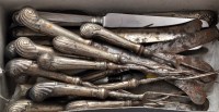 Lot 587 - Six Georgian table knives with filled silver...